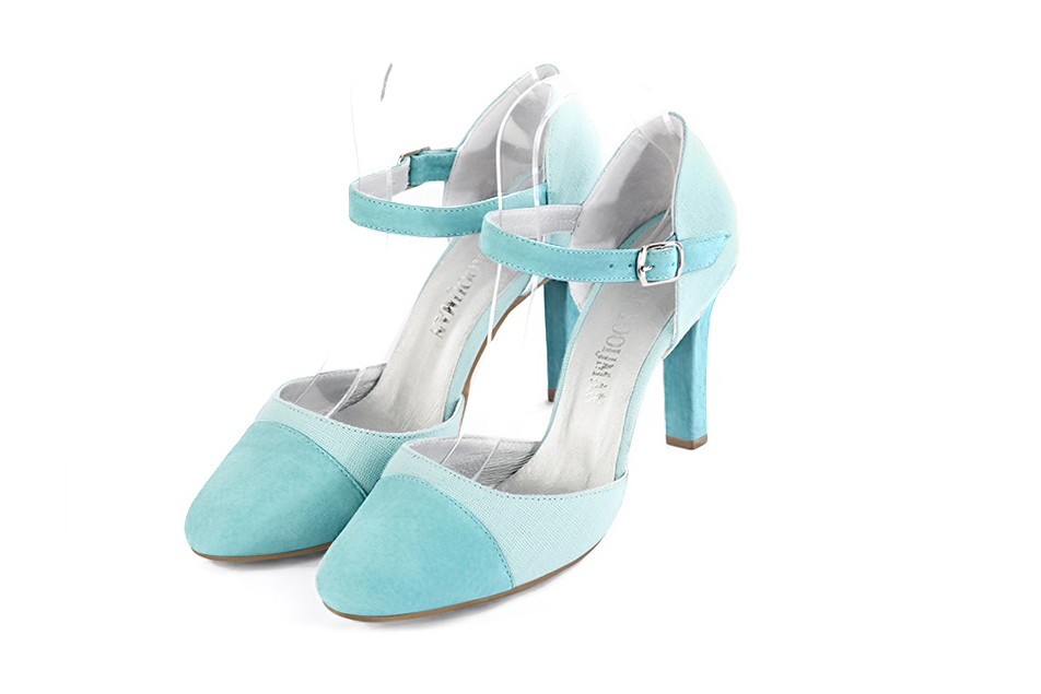 French elegance and refinement for these aquamarine blue dress open side shoes, with an instep strap, 
                available in many subtle leather and colour combinations. Its high vamp and fitted strap will give you good support.
To personalize or not, according to your inspiration and your needs.  
                Matching clutches for parties, ceremonies and weddings.   
                You can customize these shoes to perfectly match your tastes or needs, and have a unique model.  
                Choice of leathers, colours, knots and heels. 
                Wide range of materials and shades carefully chosen.  
                Rich collection of flat, low, mid and high heels.  
                Small and large shoe sizes - Florence KOOIJMAN